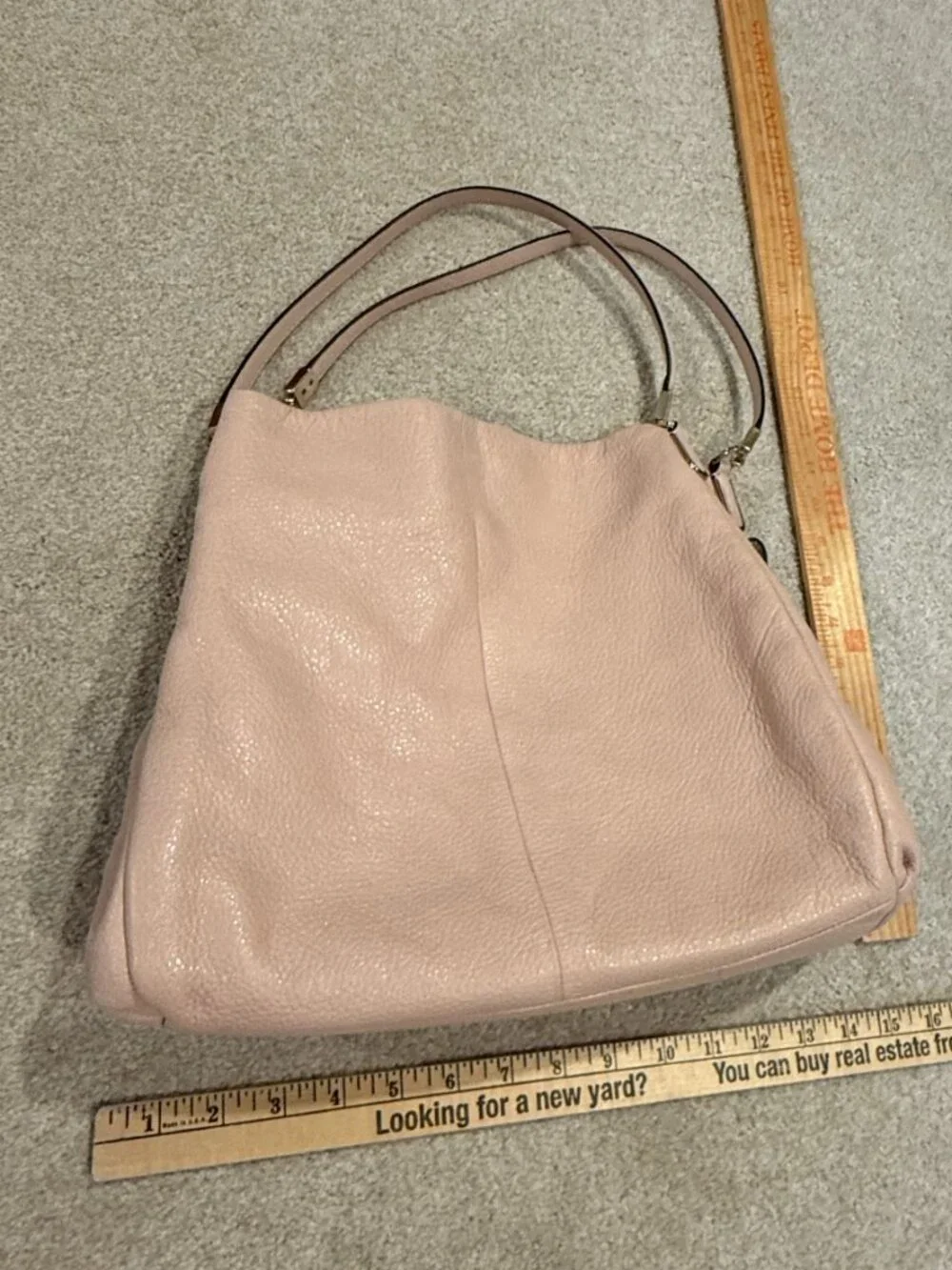 Coach Madison Phoebe handbag, featured in a soft blush pink pebbled leather